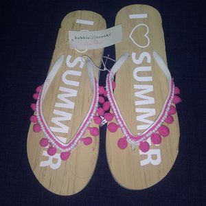 flip flops with wording on it
